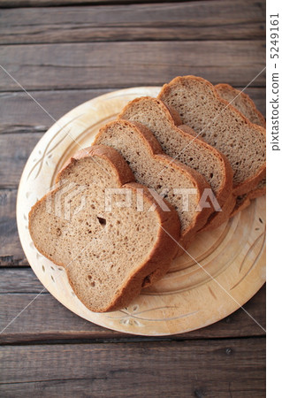Low-carb bran bread baked in a home bakery - handmade bread Low-carb bran bread baked in a home bakery - handmade bread 5249161