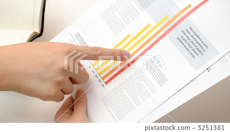 Bar chart and hand 5251381