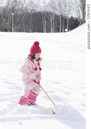Girls playing in the snow 5263443