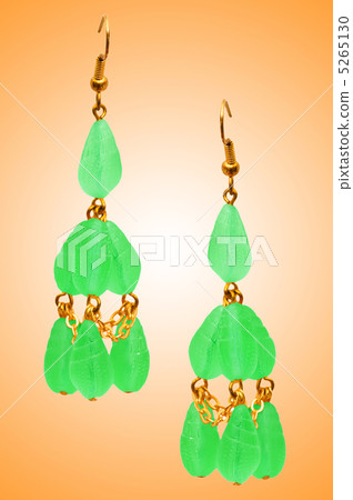 Jewellery concept with nice earrings Jewellery concept with nice earrings 5265130