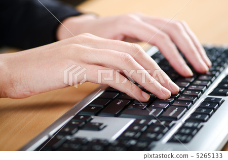 Hands typing on the keyboard Hands typing on the keyboard 5265133