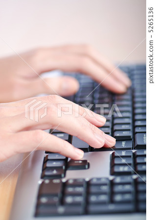 Hands typing on the keyboard 5265136
