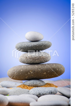 Balanced pebbles with colour background Balanced pebbles with colour background 5265148