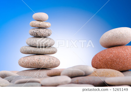 Pebbles stack against gradient background Pebbles stack against gradient background 5265149