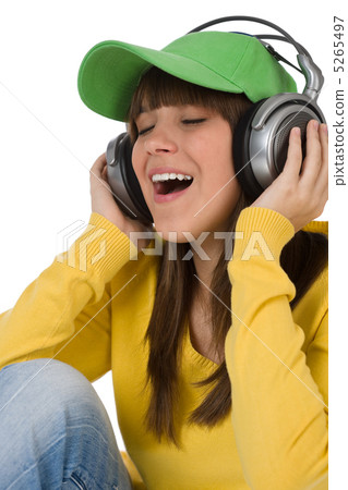 Happy female teenager enjoy music 5265497