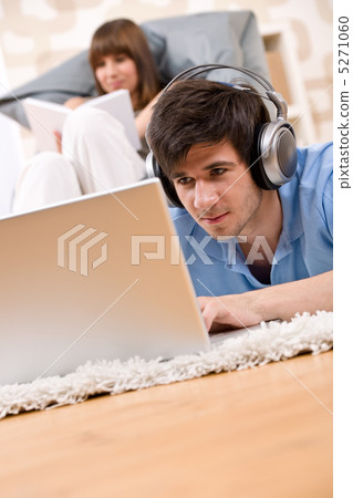Student - Two teenager with laptop and headphones Student - Two teenager with laptop and headphones 5271060
