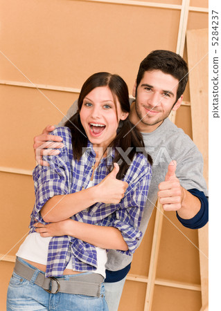 Home improvement young happy couple thumb up 5284237