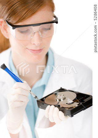 Female computer engineer - woman repair hard disc 5286408