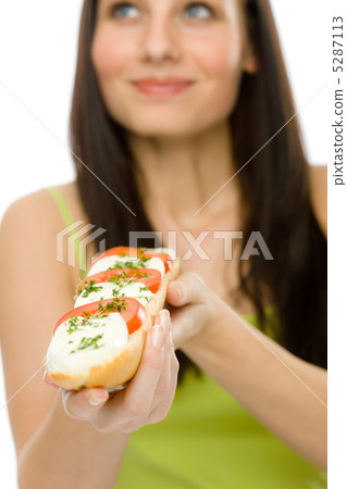 Healthy lifestyle - woman enjoy caprese sandwich Healthy lifestyle - woman enjoy caprese sandwich 5287113