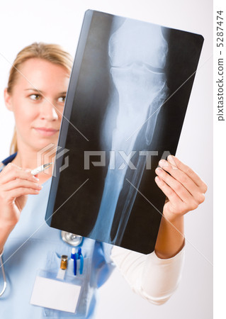 Medical person: Nurse / young doctor female 5287474