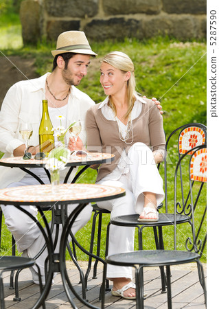 Restaurant terrace elegant couple celebrate sunny day Restaurant terrace elegant couple celebrate sunny day 5287590
