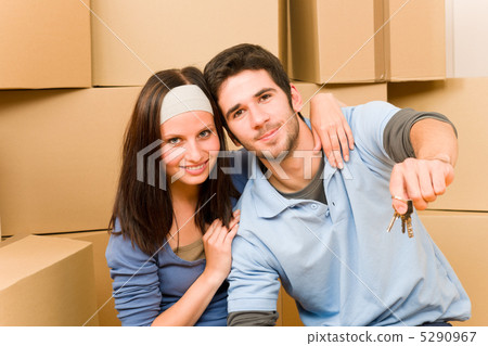 Moving new home young couple hold keys 5290967