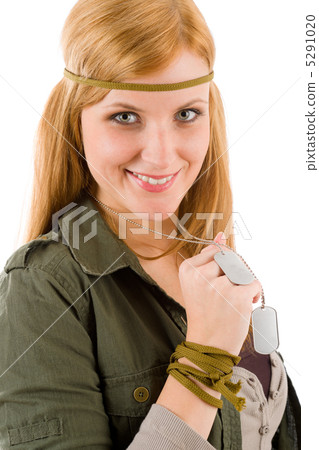 Hippie young woman in khaki outfit hold dog-tag Hippie young woman in khaki outfit hold dog-tag 5291020