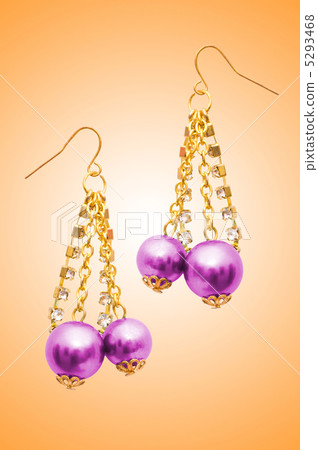 Jewellery concept with nice earrings Jewellery concept with nice earrings 5293468