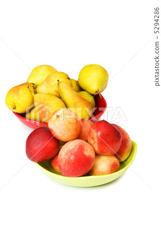 Plates with peaches and nectarines on the white Plates with peaches and nectarines on the white 5294286
