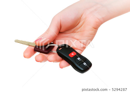Hand holding keys isolated on the white Hand holding keys isolated on the white 5294287