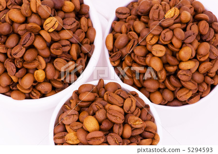 Three white cups full of coffee beans Three white cups full of coffee beans 5294593