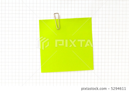 Green note with clip on the paper Green note with clip on the paper 5294611