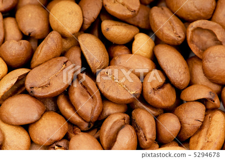 Close up of freshly roasted coffee beans Close up of freshly roasted coffee beans 5294678