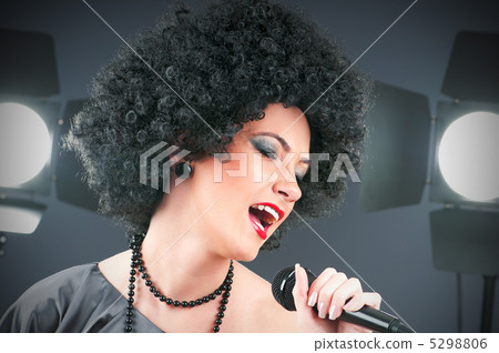Pop star singing the song at concert Pop star singing the song at concert 5298806