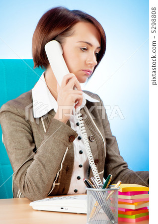 Young businesswoman talking on the phone Young businesswoman talking on the phone 5298808