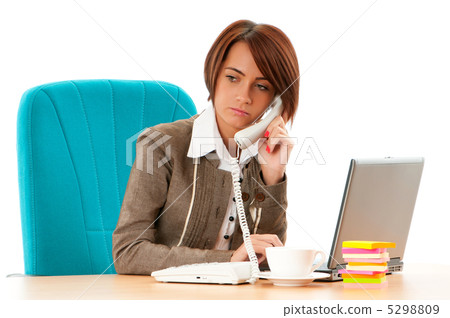 Young business woman working in the office Young business woman working in the office 5298809