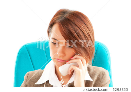 Young businesswoman talking on the phone 5298833