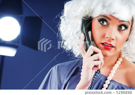Attractive woman speaking on the phone Attractive woman speaking on the phone 5298898