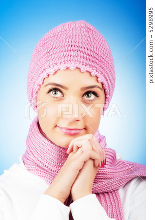 Nice looking woman in the warm clothing 5298995