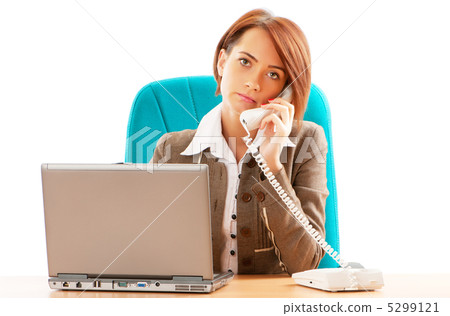 Young business woman working in the office Young business woman working in the office 5299121