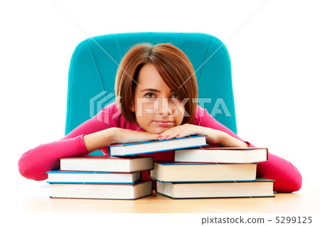 Young female student with many study books Young female student with many study books 5299125