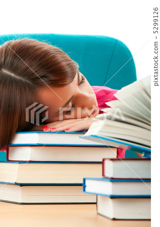 Young female student with many study books Young female student with many study books 5299126