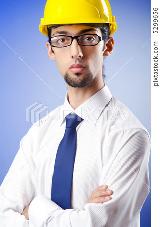 Young engineer wearing hard hat 5299656