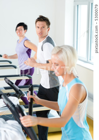 Fitness young people on treadmill running exercise 5300079