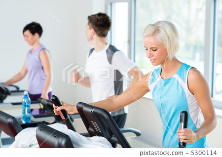 Fitness young people on treadmill running exercise Fitness young people on treadmill running exercise 5300114