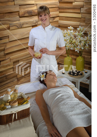Woman and masseur at luxury spa room Woman and masseur at luxury spa room 5300498