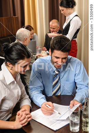 Business meeting young executives at restaurant Business meeting young executives at restaurant 5300499