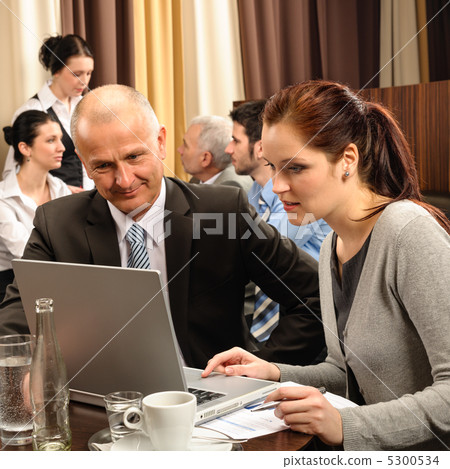 Business discussion executive woman look laptop Business discussion executive woman look laptop 5300534