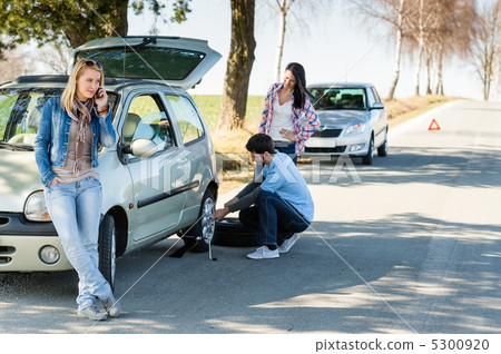 Wheel defect man helping two female friends 5300920
