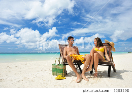 Couple on a beach 5303398