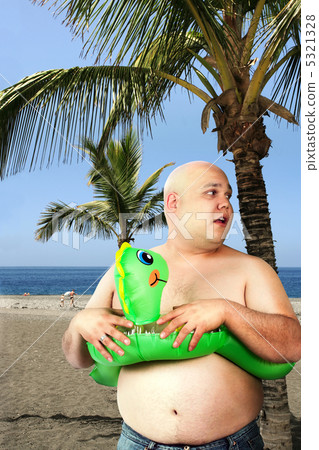 Fat man on the beach Fat man on the beach 5321328