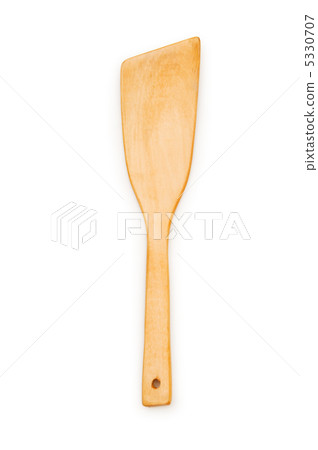 Wooden spatula isolated on the white background Wooden spatula isolated on the white background 5330707
