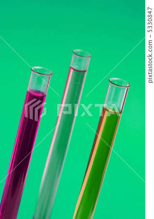Three retorts in the lab against green background Three retorts in the lab against green background 5330847