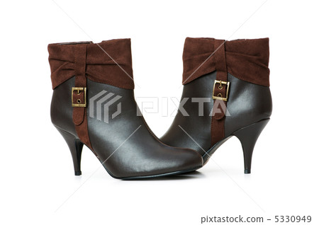 Brown boots isolated on the white background Brown boots isolated on the white background 5330949