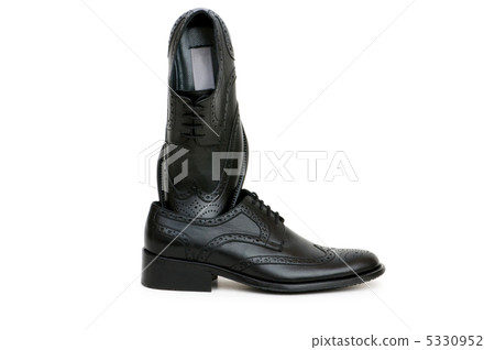 Black shoes isolated on the white background 5330952