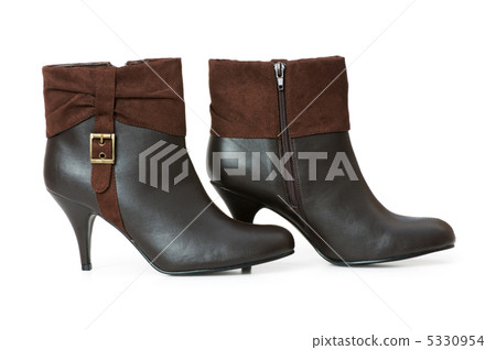 Brown boots isolated on the white background Brown boots isolated on the white background 5330954