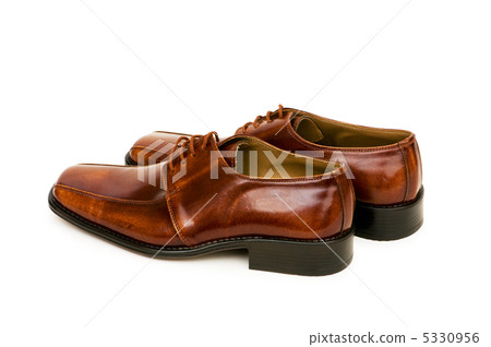 Brown shoes isolated on the white background Brown shoes isolated on the white background 5330956