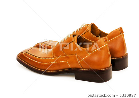 Orange shoes isolated on the white background Orange shoes isolated on the white background 5330957