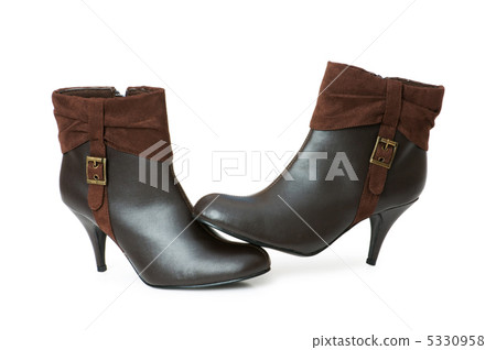 Brown boots isolated on the white background Brown boots isolated on the white background 5330958