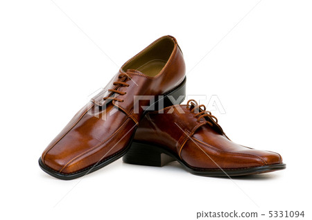 Brown shoes isolated on the white background Brown shoes isolated on the white background 5331094
